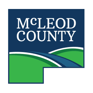 Buddy Boy Catering - McLeod County logo featuring white text on a blue background above green hills and a winding blue road.